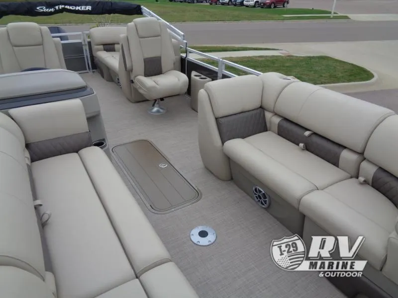 Slide: The Image of 2025 Party Barge PB22XP3 pontoon boat interior with beige seating and spacious layout. - 21