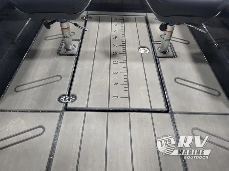 Slide: The Image of 2025 Nitro ZV21 boat deck with ruler and seating, RV Marine logo visible. - 12