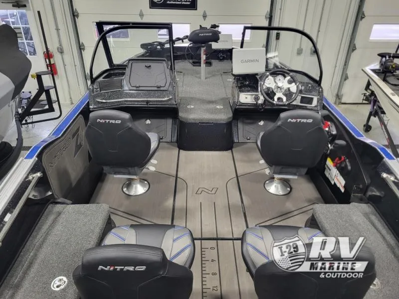 Slide: The Image of Interior of a 2025 Nitro ZV21 boat with modern seating and navigation equipment. - 7