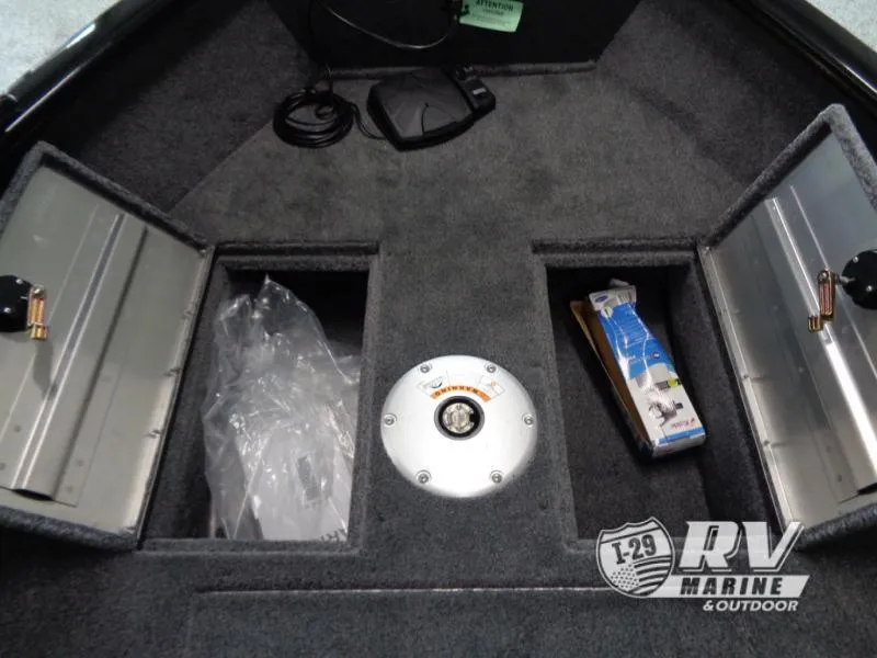Slide: The Image of 2025 SUPER GUIDE SG16 boat storage compartments with carpeted interior and accessories. - 13