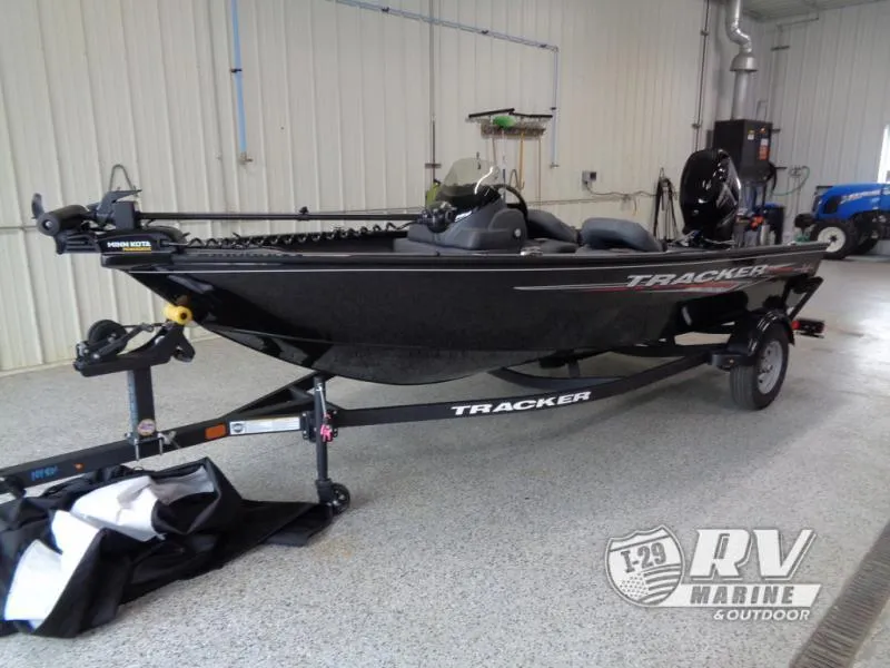 Slide: The Image of 2025 SUPER GUIDE SG16 boat on trailer in indoor showroom. - 3