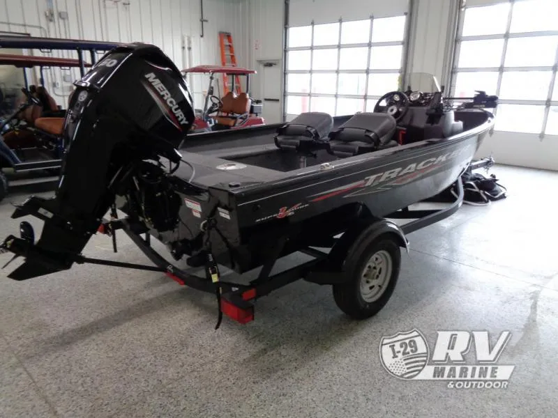 Slide: The Image of 2025 SUPER GUIDE SG16 boat with Mercury engine in showroom. - 5