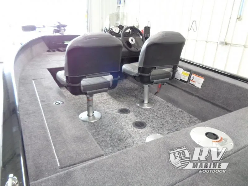 Slide: The Image of 2025 SUPER GUIDE SG16 boat interior with dual seats and steering console. - 9