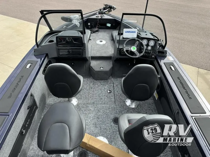 Slide: The Image of 2025 Targa 18 boat interior with dual seats and navigation equipment. - 10