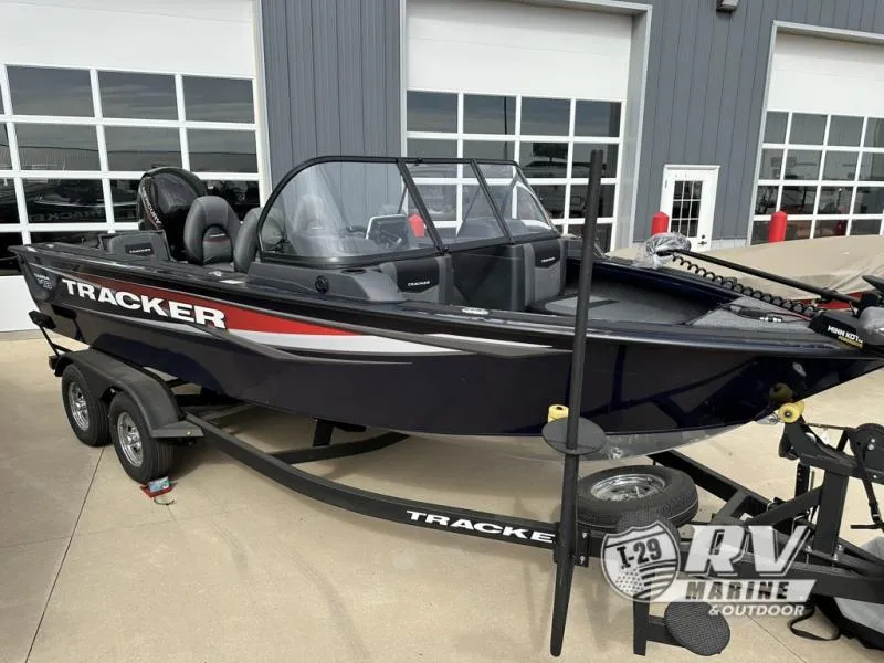 Slide: The Image of 2025 Targa 18 boat on trailer at RV Marine dealership. - 11
