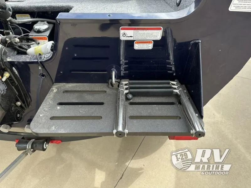 Slide: The Image of 2025 Targa 18 boat with foldable ladder and RV Marine branding. - 13