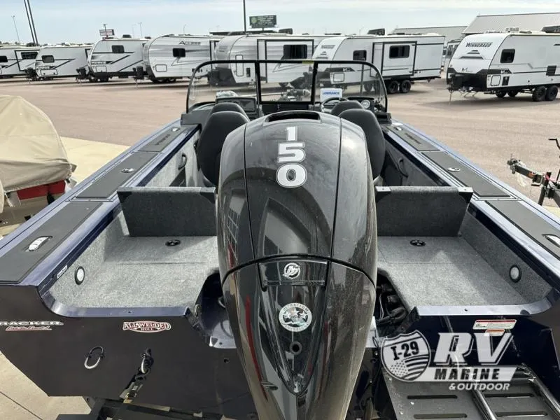 Slide: The Image of 2025 Targa 18 boat with 150 HP engine at RV Marine dealership. - 14