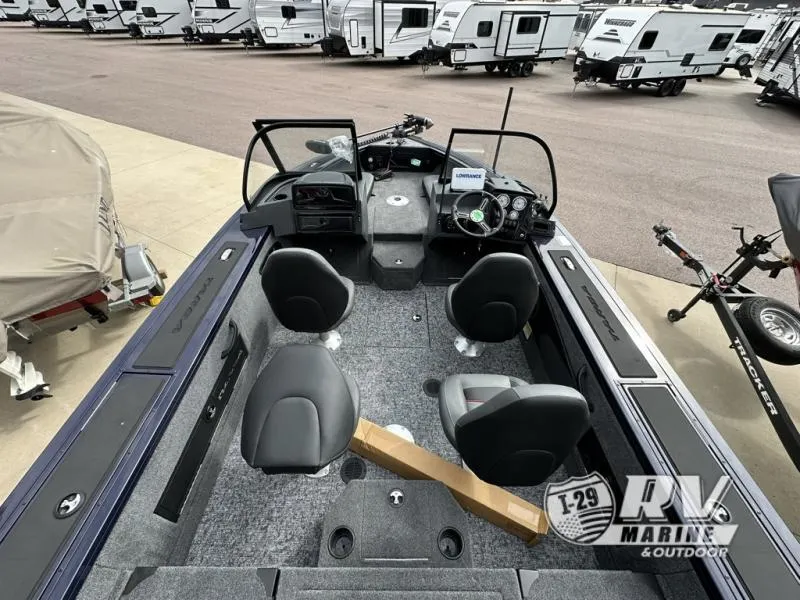 Slide: The Image of 2025 Targa 18 boat interior with seating, dashboard, and controls at RV Marine & Outdoor. - 18