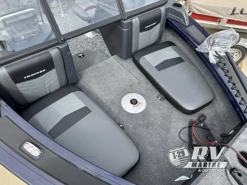 Slide: The Image of 2025 Targa 18 boat interior with gray seating and carpeted floor. - 3