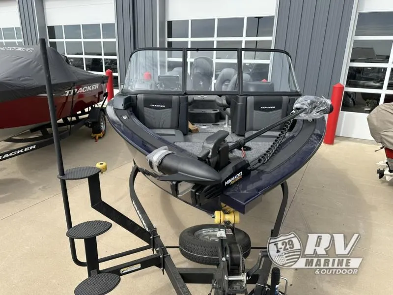 Slide: The Image of 2025 Targa 18 boat on trailer at RV Marine dealership. - 7