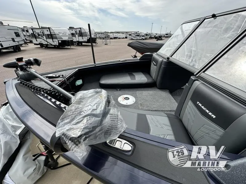 Slide: The Image of 2025 Targa 18 boat interior with seating and windshield at RV Marine dealership. - 8