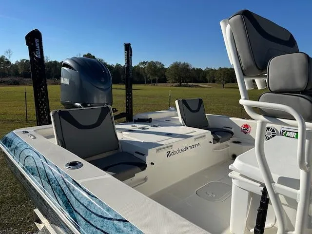 Slide: The Image of 2023 Skeeter SX241 boat with Yamaha engine, featuring comfortable seating and sleek design. - 4