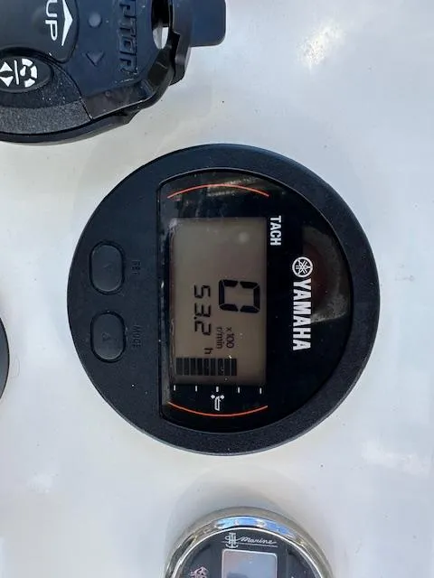 Slide: The Image of Yamaha tachometer display on 2023 Skeeter SX241 boat dashboard. - 5