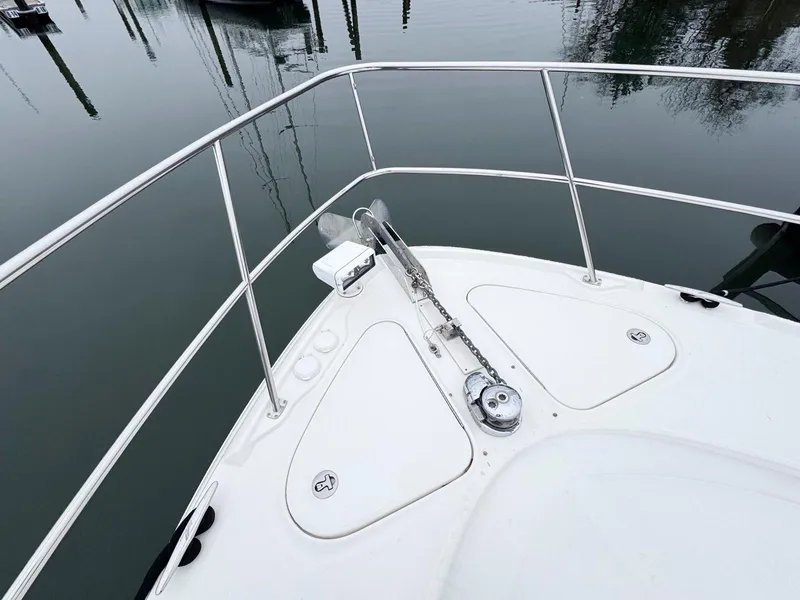 Slide: The Image of Bow of 2006 Sea Ray 48 Sundancer yacht with anchor and railing. - 13