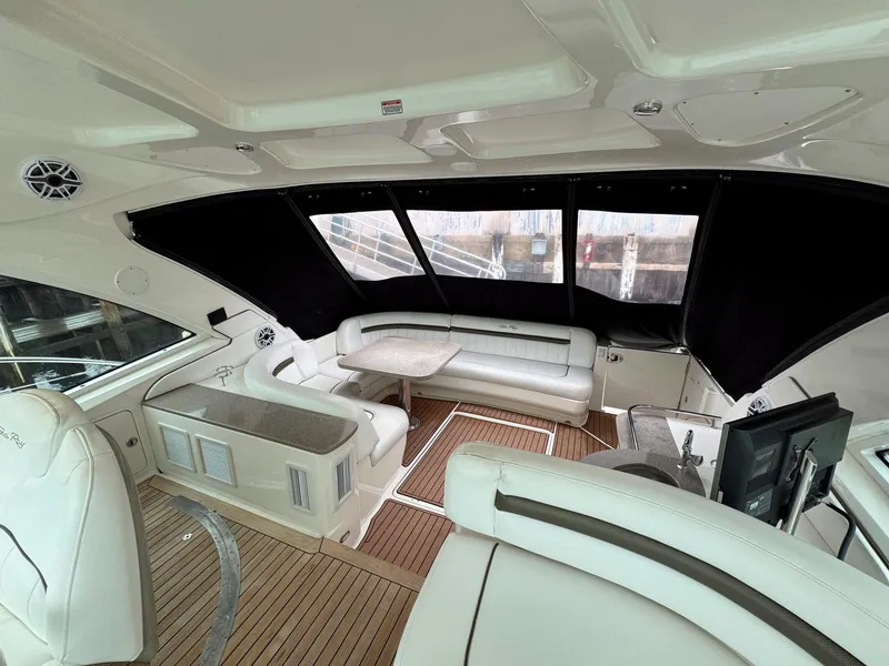 Slide: The Image of Luxurious 2006 Sea Ray 48 Sundancer yacht interior with plush seating and modern amenities. - 5