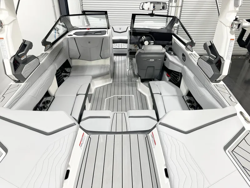 Slide: The Image of 2025 Nautique Super Air Nautique G21 interior, featuring sleek, modern design and spacious seating. - 7