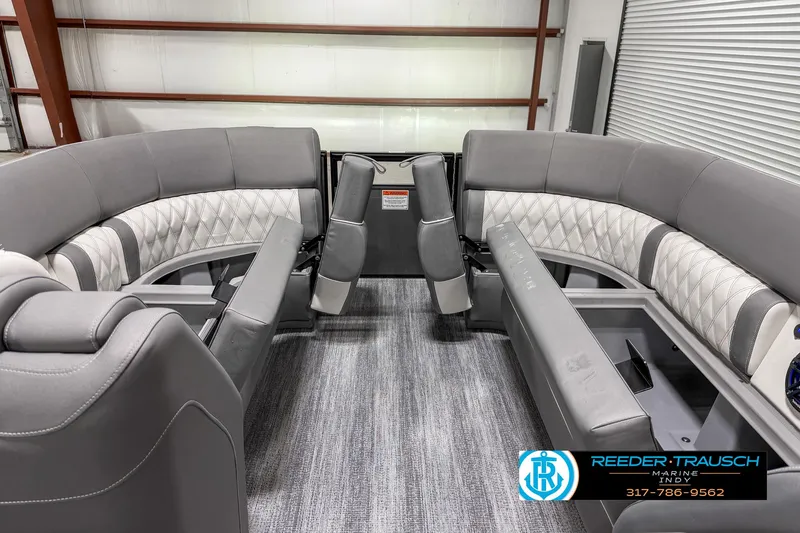 Slide: The Image of 2025 Bennington 23 RSB boat interior with luxurious gray seating and modern design. - 25