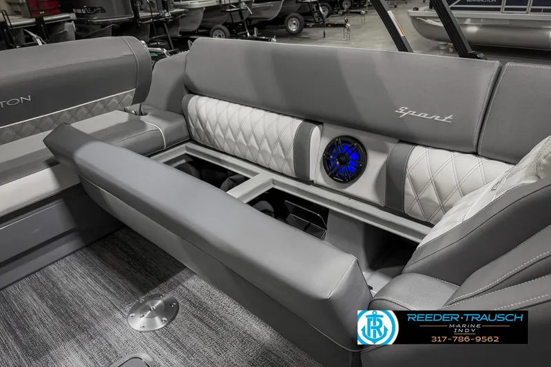 Slide: The Image of 2025 Bennington 23 RSB boat interior with gray seating and speaker system. - 31