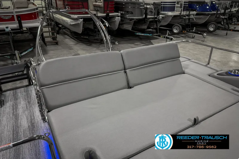 Slide: The Image of 2025 Bennington 23 RSB pontoon boat interior with gray seating in showroom. - 36