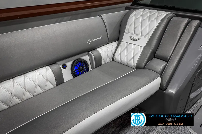 Slide: The Image of Luxurious seating in 2025 Bennington 23 RSB boat with elegant gray upholstery and blue speaker. - 46