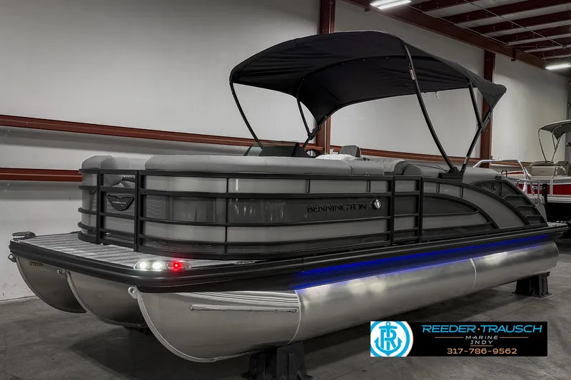 Slide: The Image of 2025 Bennington 23 RSB pontoon boat with canopy in showroom. - 8