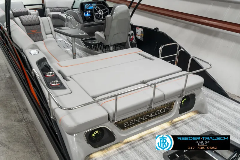 Slide: The Image of 2025 Bennington 23 RSB boat interior with modern seating and steering console. - 12