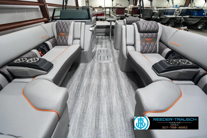 Slide: The Image of Luxurious interior of 2025 Bennington 23 RSB pontoon boat with plush seating and modern design. - 13