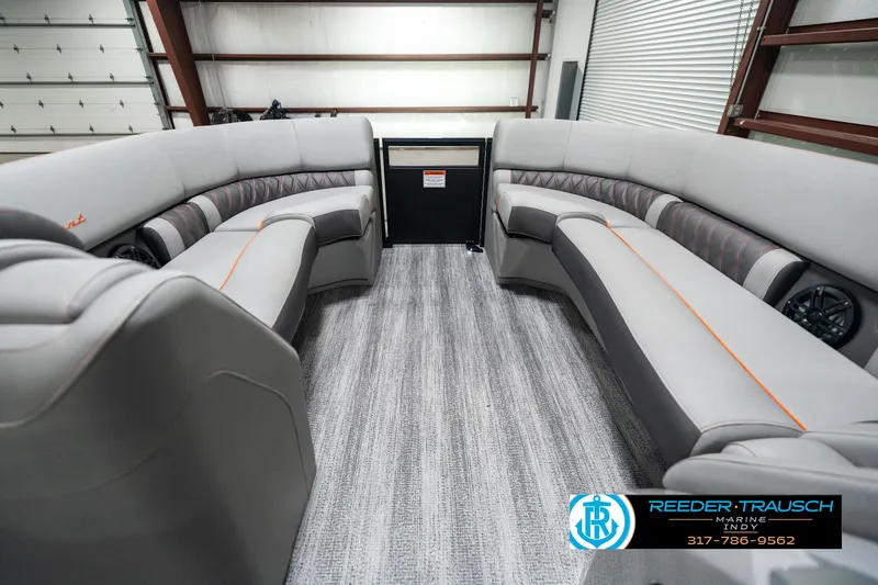 Slide: The Image of 2025 Bennington 23 RSB boat interior with gray seating and modern design. - 19