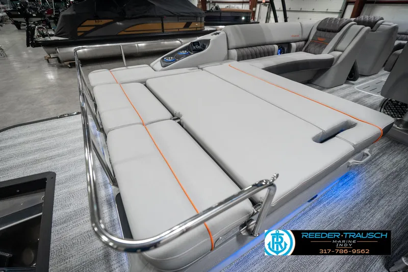 Slide: The Image of 2025 Bennington 23 RSB luxury boat interior with plush seating and modern design. - 28
