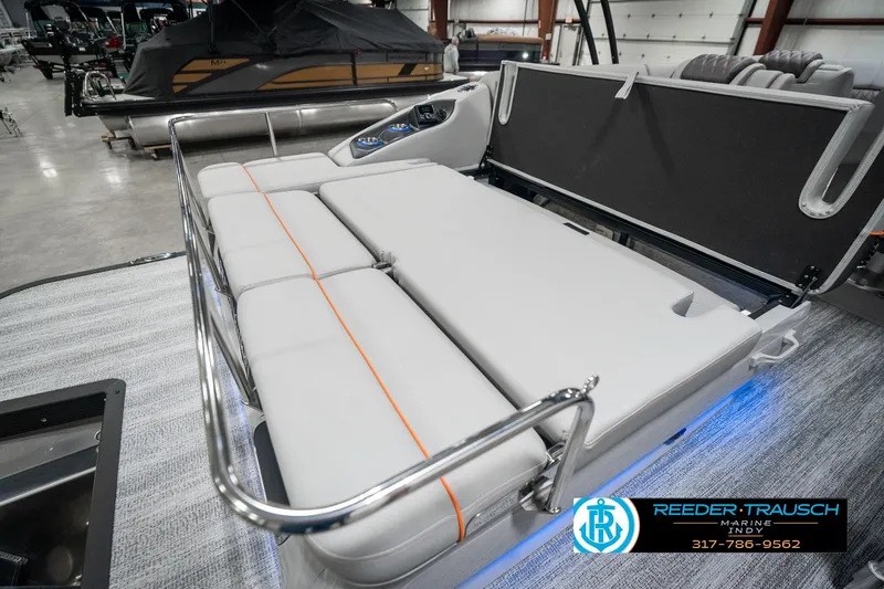 Slide: The Image of 2025 Bennington 23 RSB boat interior with convertible seating and modern design. - 29