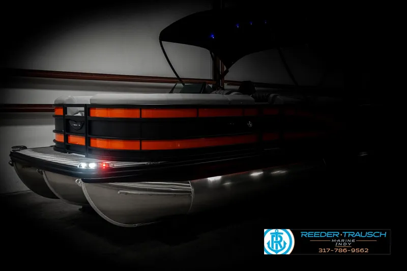 Slide: The Image of 2025 Bennington 23 RSB pontoon boat with sleek design and modern features. - 4