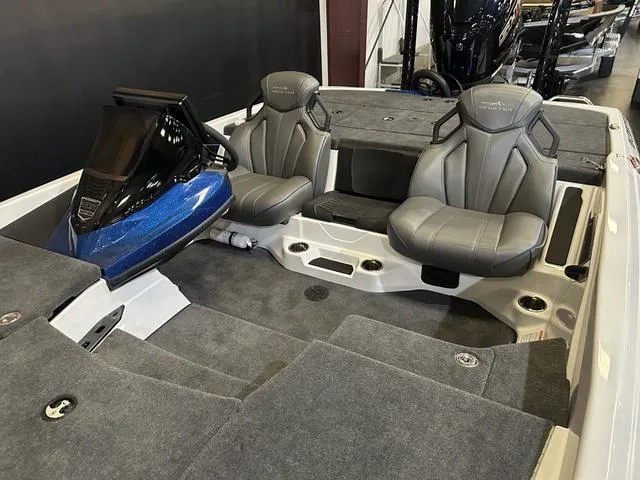 Slide: The Image of 2024 Skeeter ZXR 20 boat interior with Yamaha 250 SHO engine, featuring dual seats and carpeted flooring. - 10