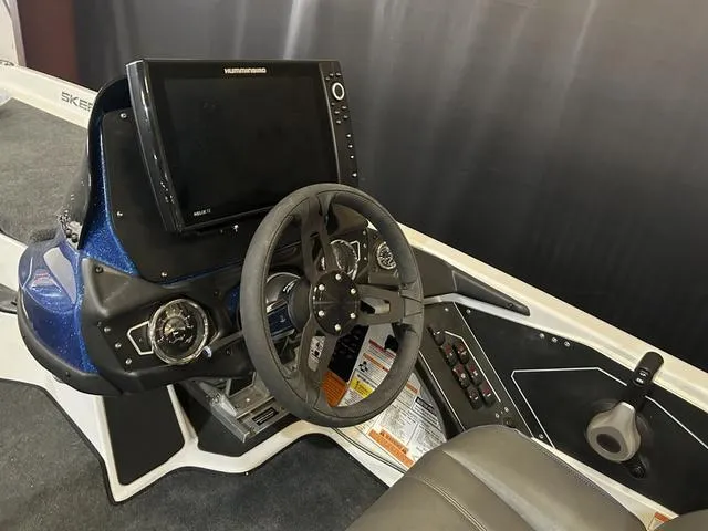 Slide: The Image of 2024 Skeeter ZXR 20 boat dashboard with Yamaha 250 "SHO" controls and Humminbird display. - 12