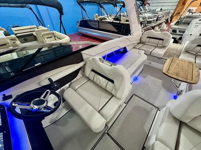 Slide: The Image of Luxurious 2025 Regal LS6 boat interior with plush seating and modern design. - 28