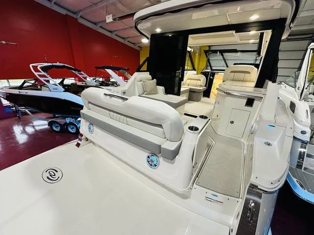 Slide: The Image of 2025 Regal 36 Grande Coupe luxury yacht interior in showroom. - 6