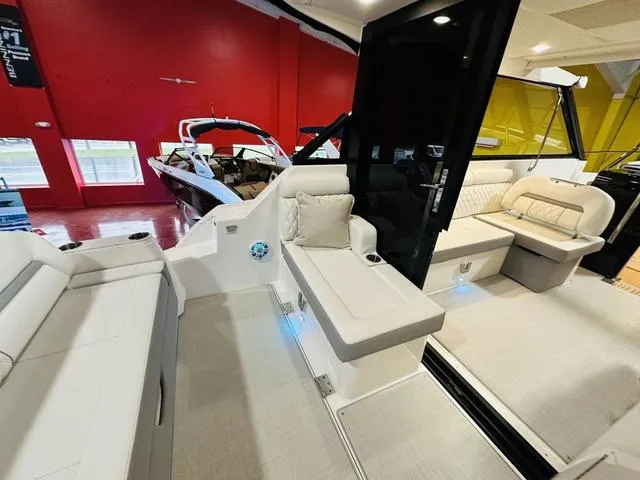 Slide: The Image of 2025 Regal 36 Grande Coupe interior with modern seating and sleek design. - 8