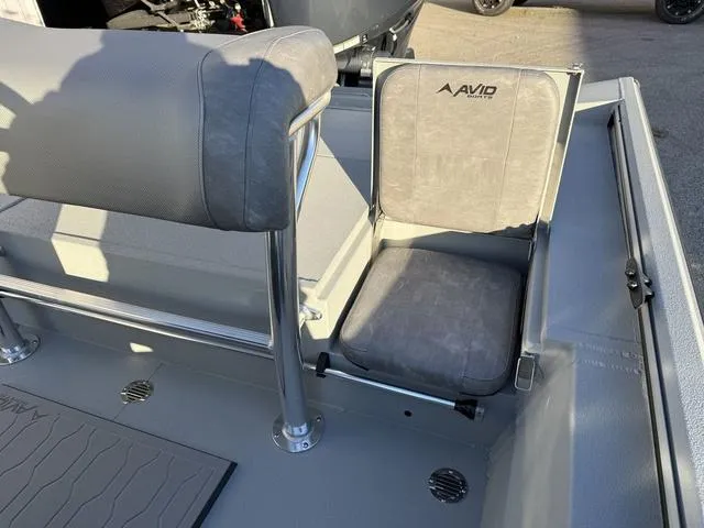 Slide: The Image of 2025 Avid 20 ROGUE CC boat interior with seating and console details. - 17
