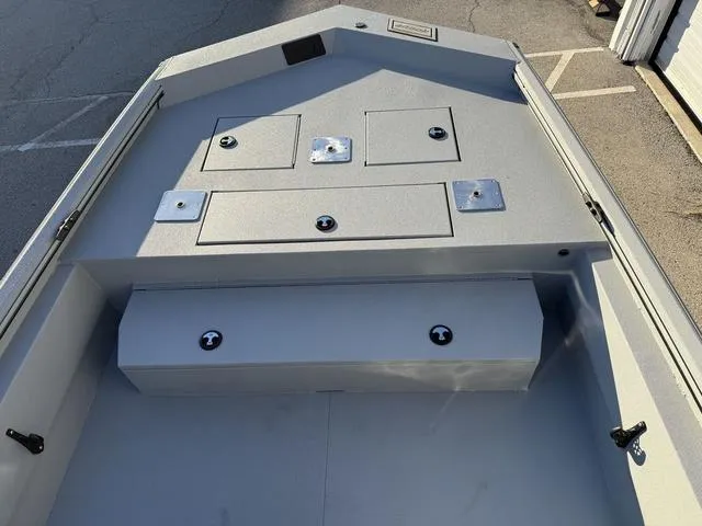 Slide: The Image of 2025 Avid 20 ROGUE CC boat deck with storage compartments. - 7