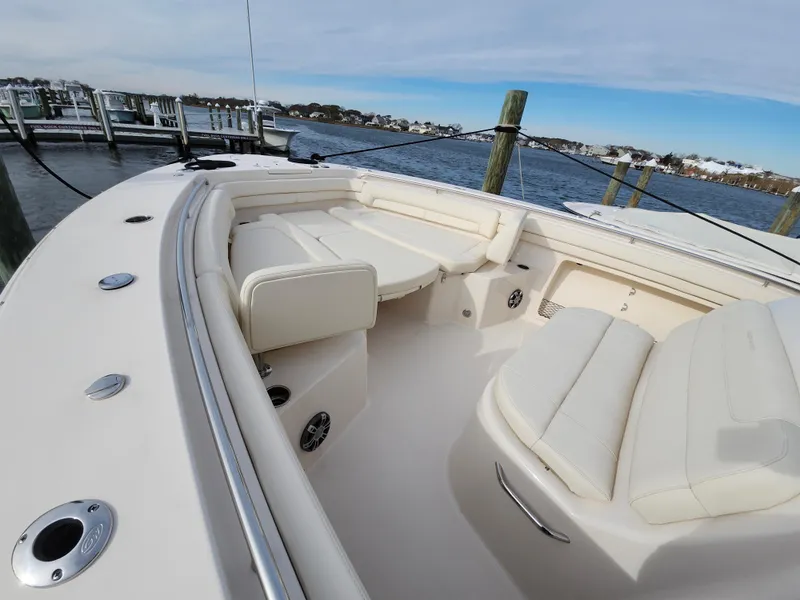 Slide: The Image of 2023 Grady-White Canyon 376 boat with spacious seating and luxurious interior. - 31