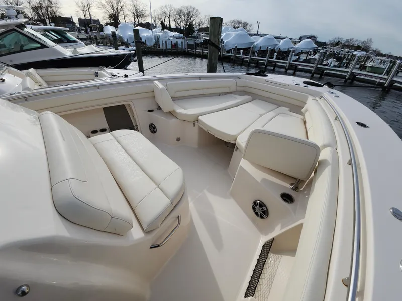 Slide: The Image of 2023 Grady-White Canyon 376 boat interior with spacious seating and modern design. - 32