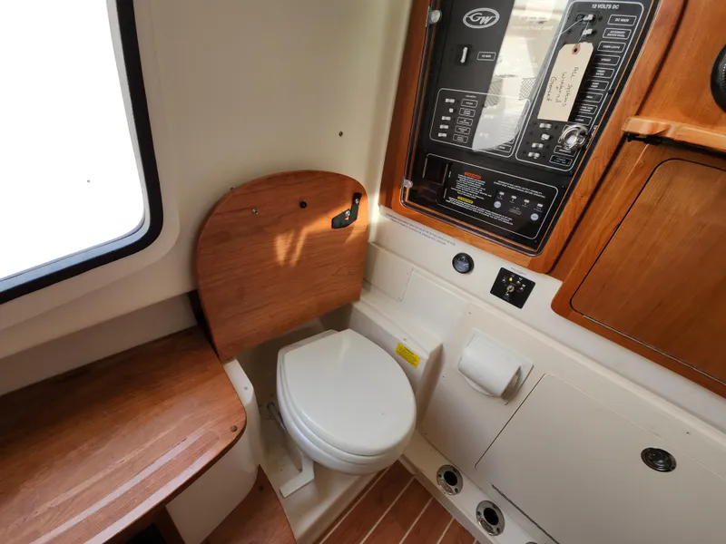 Slide: The Image of Electrical control panel of 2023 Grady-White Canyon 376 boat. - 39