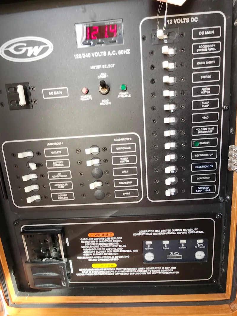 Slide: The Image of 2023 Grady-White Canyon 376 with triple Yamaha outboard engines docked at marina. - 41