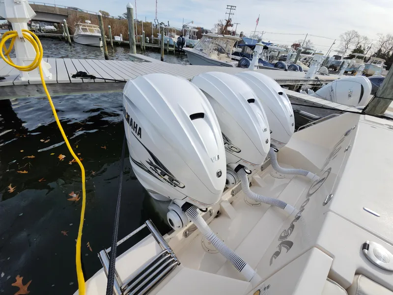 Slide: The Image of Stainless steel hatch on 2023 Grady-White Canyon 376 boat interior. - 43