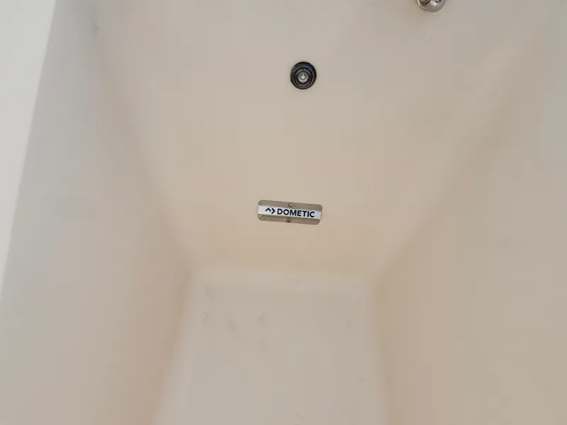 Slide: The Image of 2023 Grady-White Canyon 376 boat interior with open transom door. - 47