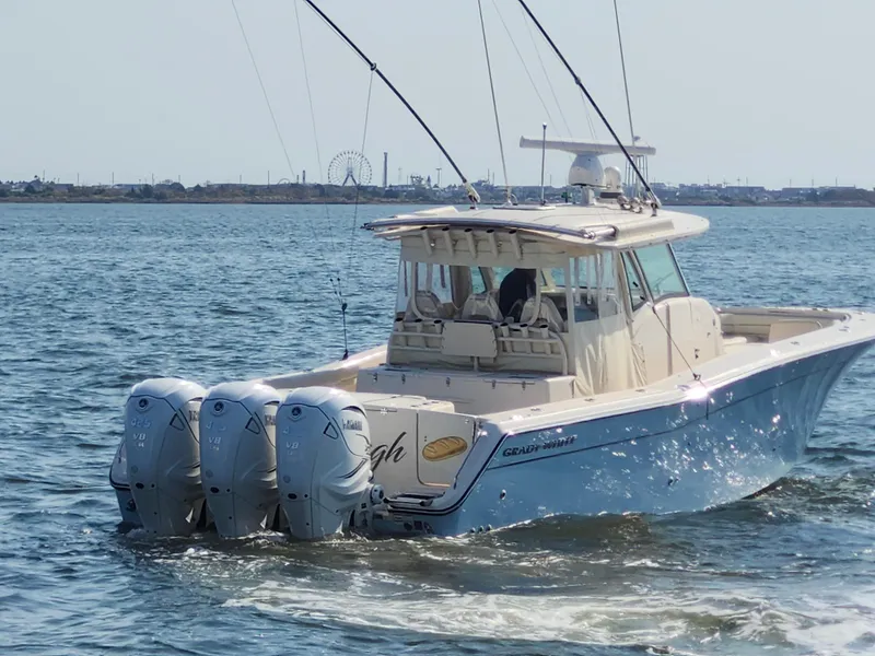 Slide: The Image of 2023 Grady-White Canyon 376 boat docked in marina. - 9
