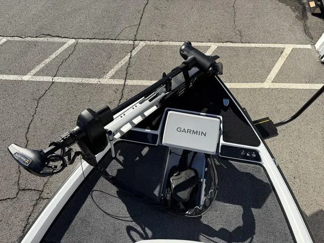 Slide: The Image of 2025 Phoenix 721 ZXL boat with Garmin navigation system and trolling motor. - 10