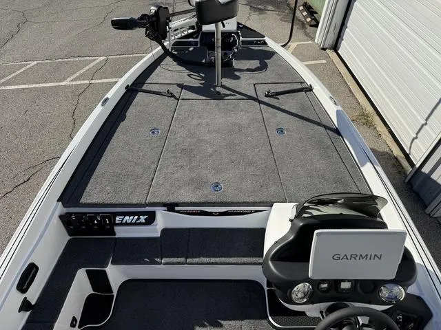 Slide: The Image of 2025 Phoenix 721 ZXL boat deck with Garmin electronics and trolling motor. - 12