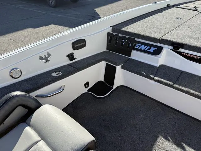 Slide: The Image of Interior of 2025 Phoenix 721 ZXL boat with seating and control panel. - 17