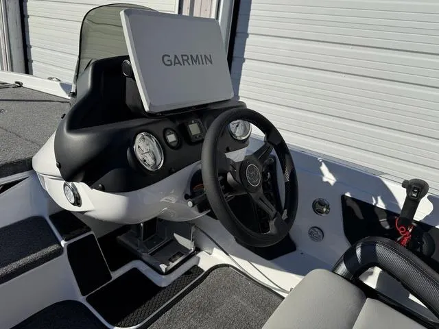 Slide: The Image of 2025 Phoenix 721 ZXL boat dashboard with Garmin navigation system. - 18