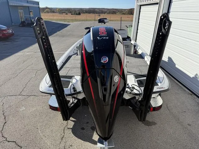 Slide: The Image of 2025 Phoenix 721 ZXL boat with powerful V8 engine, parked outdoors. - 5